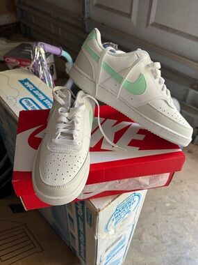 Nike White Low-Top Sneakers with Mint Swoosh